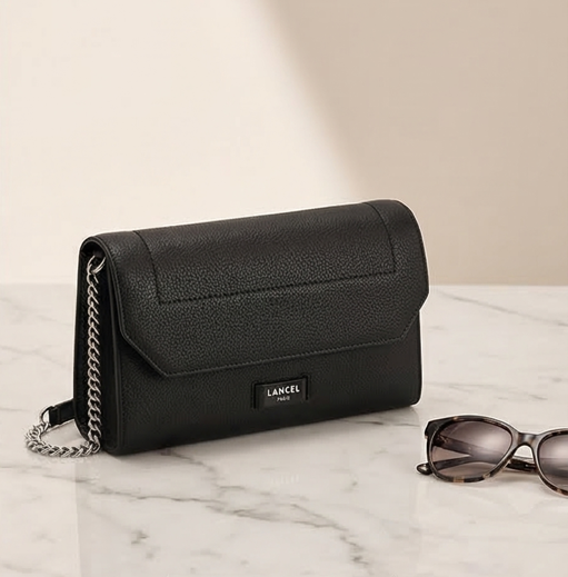Ninon grained leather wallet with shoulder strap 